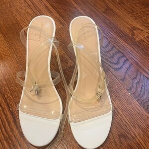 Brand new without tags clear strapped Something Navy heels